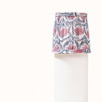 White pleated lampshade with a pink water lily print