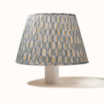 Green-gray pleated lampshade with saffron-yellow print
