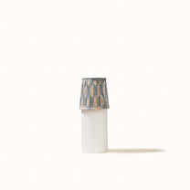 Green-gray pleated lampshade with saffron-yellow print